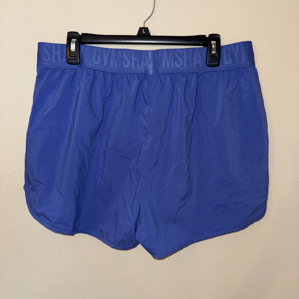 Gymshark Training Loose Fit Shorts Blue Branded Waistband Dolphin Hem Womens L - Picture 2 of 10